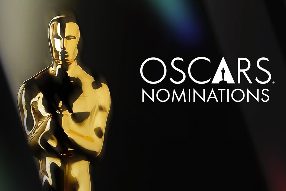 Statuetta dorata degli Oscar illuminata su sfondo scuro con la scritta “Oscar Nominations”, simbolo delle candidature ufficiali dell’Academy Awards.